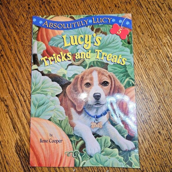 Lucy's Tricks and Treats Book by Ilene Cooper Halloween Kids Puppy Story - Picture 1 of 2